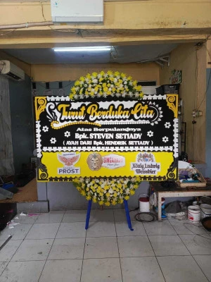 Papan Bunga di Menara Standard Chartered